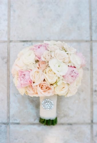 blush wedding bouquets roses with jewerly Jasmine Lee Photography