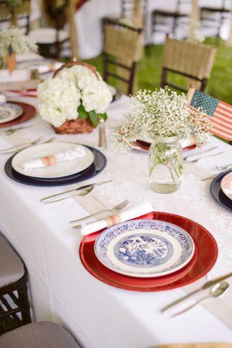 independence day wedding 4th of july rustic reception table red white and blue colors with baby breath ashley + david photography