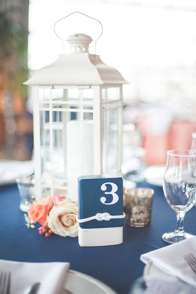 nautical wedding white blue centerpieces with lantern tablerunner shannon moffit photography