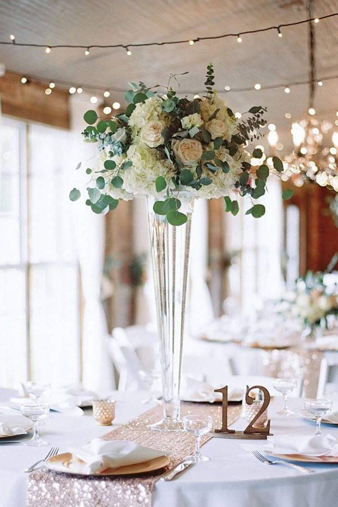 tall wedding centerpiecesbohemian glam reception tall glass vase white flowers and greenery crosscreekranchfl