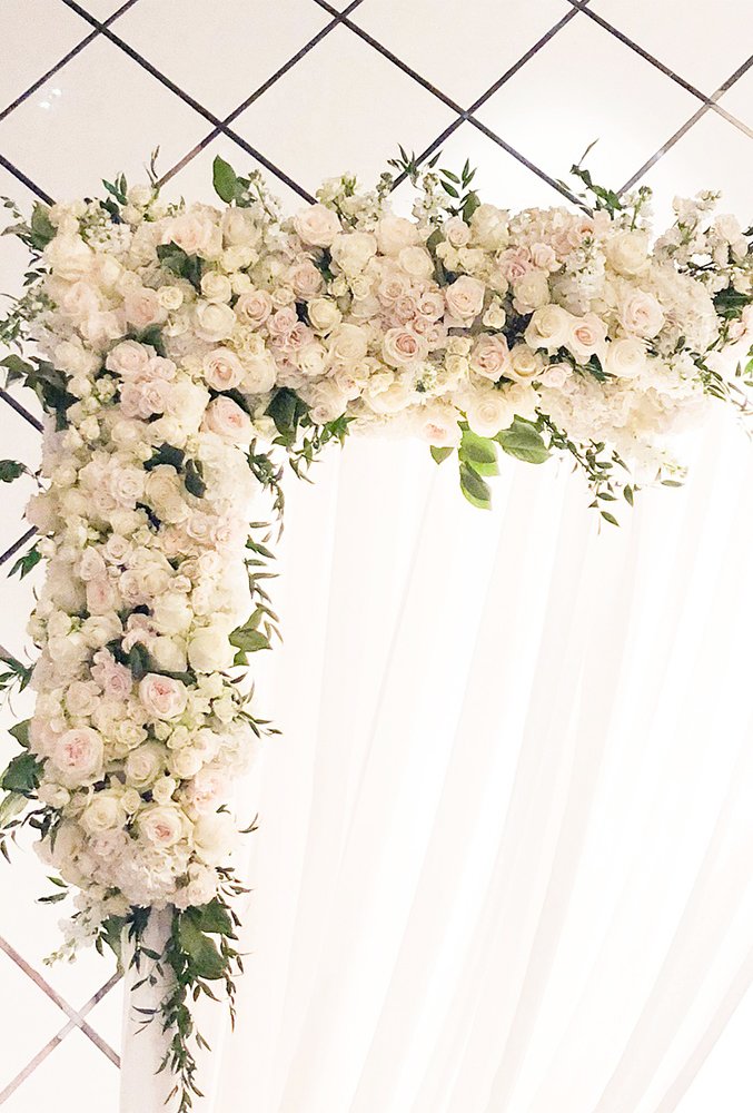 wedding arch decoration ideas white roses on arch