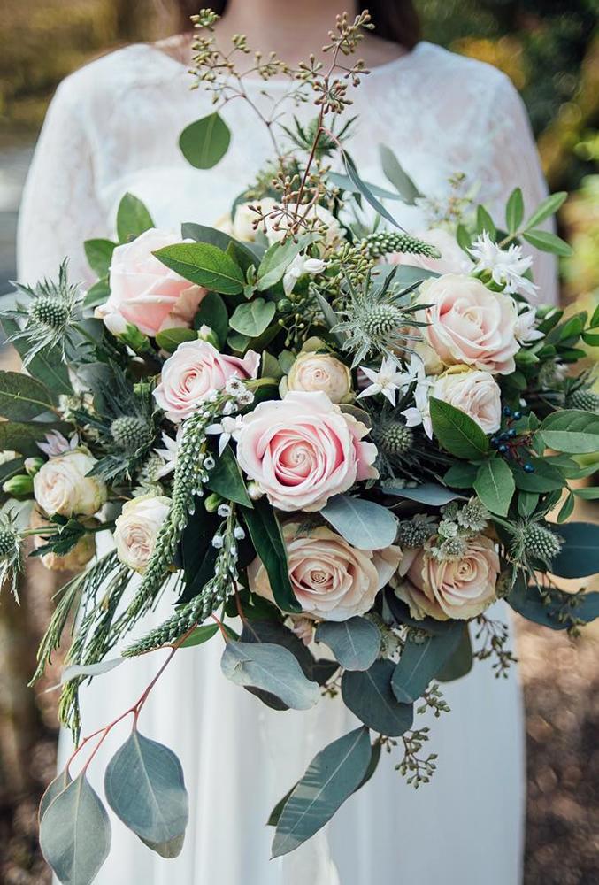green wedding florals bouquet with pink roses