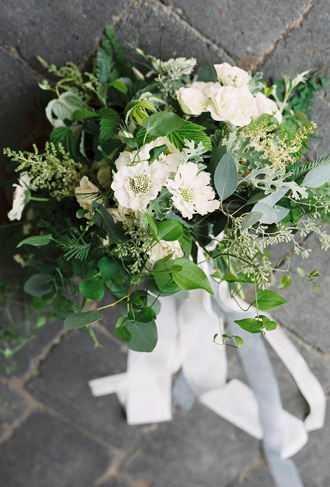 green wedding florals bouquet with white tape
