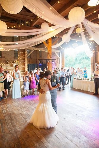 wedding hanging installations hanging tulle and lanterns Melanie Grady Photography