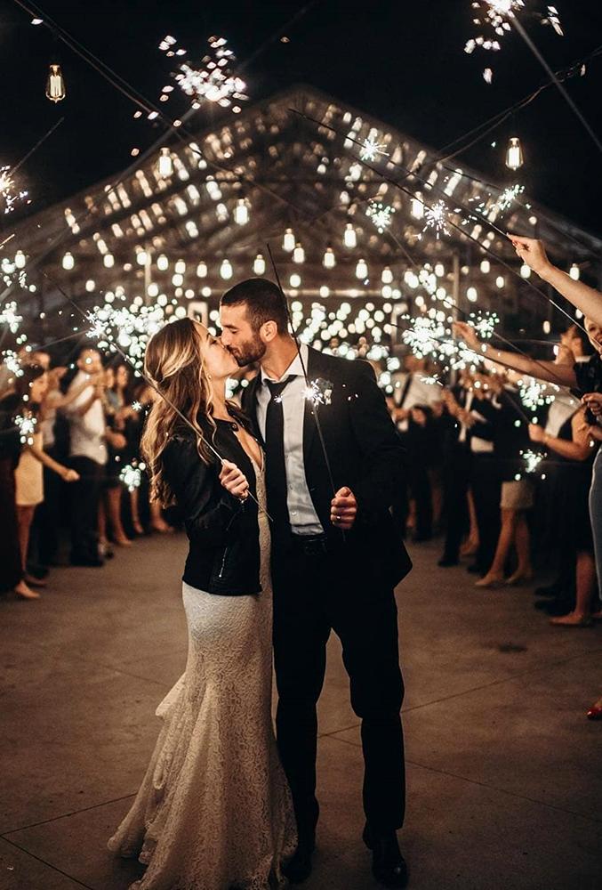 wedding light ideas kiss with sparklers lizakirkphotography