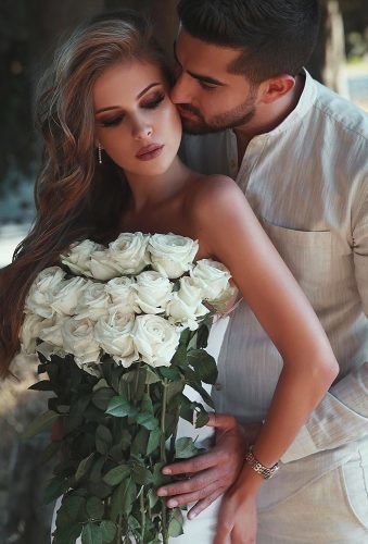wedding photographers couple and white roses saidmhamadofficial