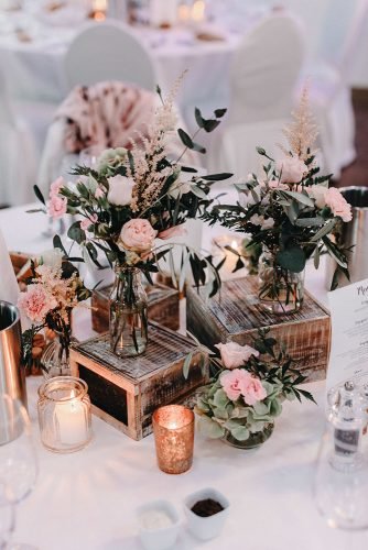 wedding centerpieces spring blush gentle roses on wooden crated rustic vintage timkurthfotografie