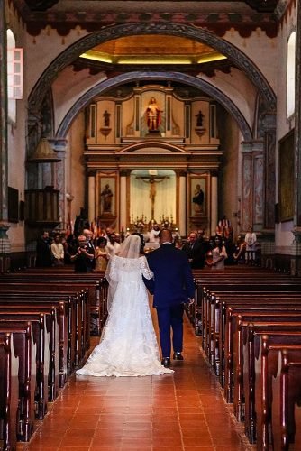 catholic wedding songs newlyweds at the church