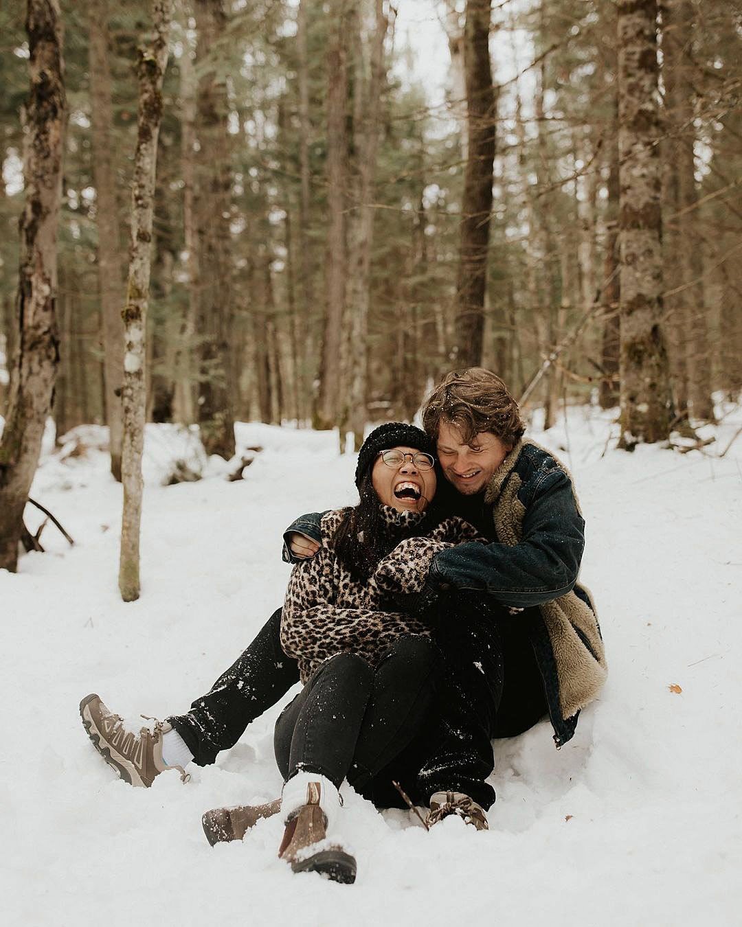 winter engagement photos-smiling couple photo forest