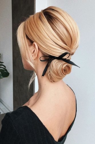 wedding updos low swept updo with black ribbon bow i_pasechnik