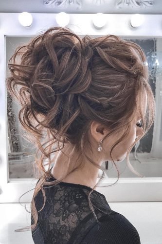 wedding updos textured high curly bun with small braid tatianasolne4naya