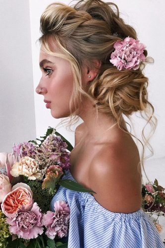 wedding updos wavy low bun with loose curls belaya_lyudmila