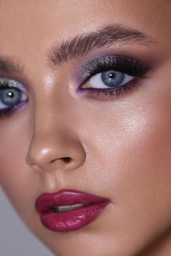 bridal makeup trends shimmer bright smokey eyes with lilac eyeliner highlight skin and bold lips sofia_baburina
