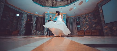 pop wedding songs bride dancing near groom featured