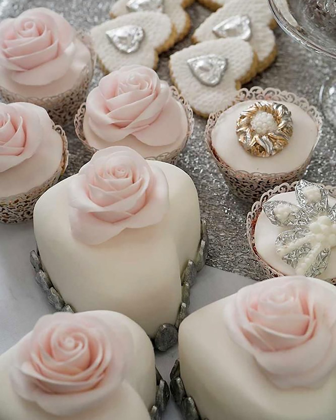 wedding cupcake tender pink and white roses and heart shaped wedding cakes