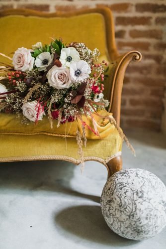 italian wedding styled shoot on mustard sofa boho bouquet edoardo giorio photography