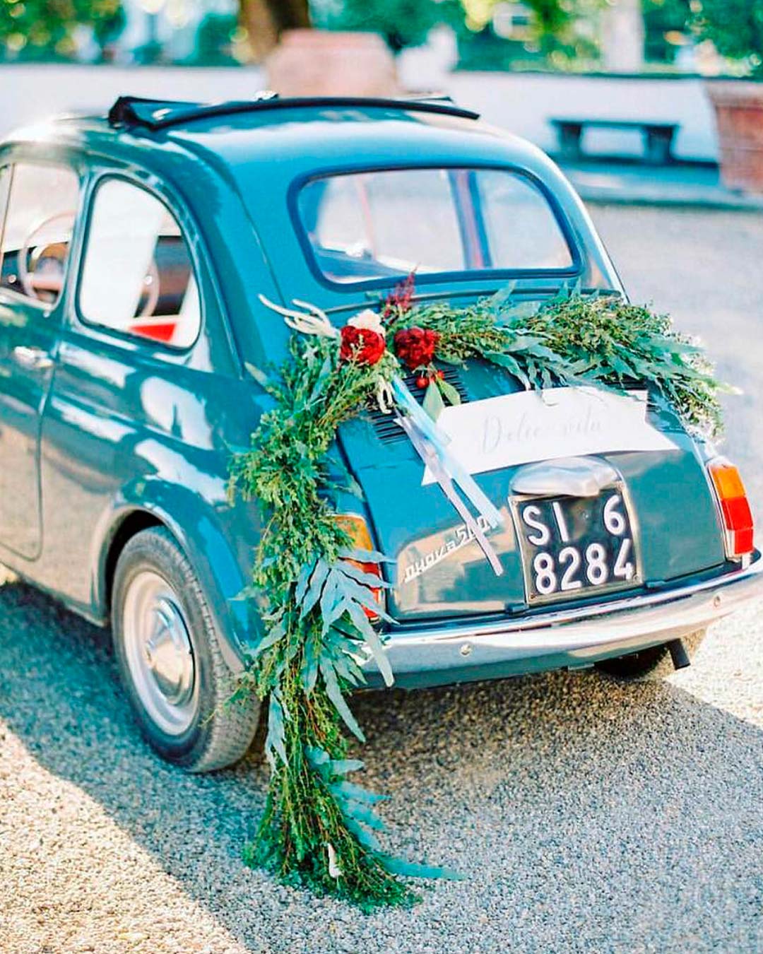 wedding car decor ideas greenery red flowers