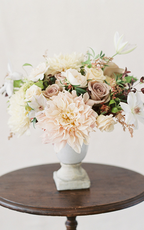 All white arrangement on large mason jars. Natural Wonders Photography