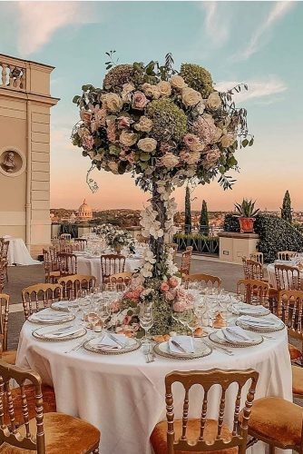 wedding centerpieces tall flower centerpiece on round table lucidweddings