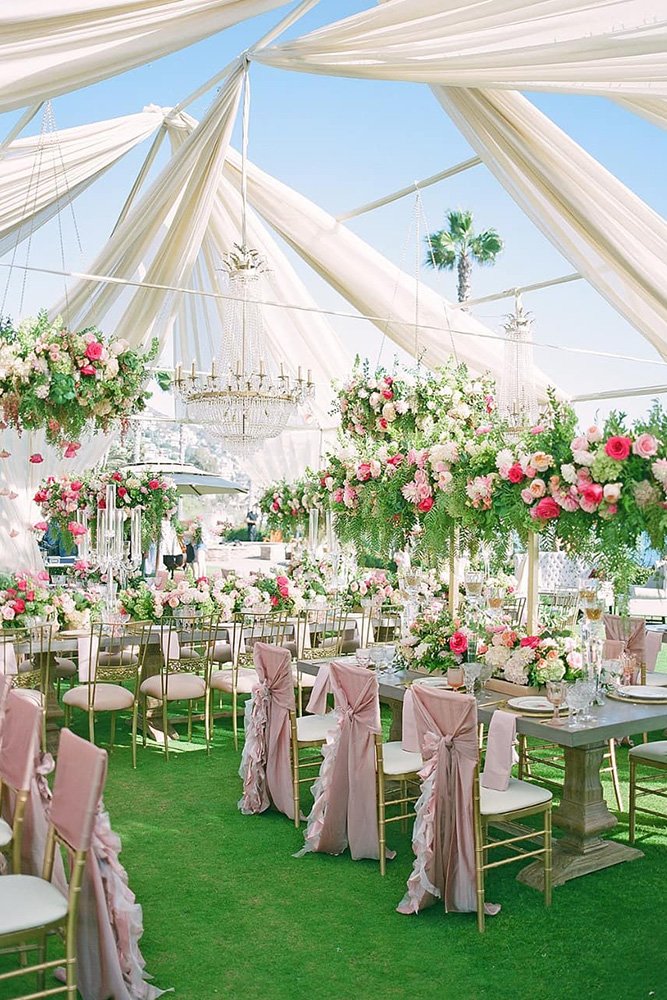 wedding tent pink decor and flowers with tall centerpieces lanedittoeweddings