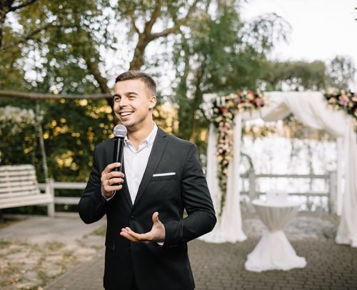 wedding welcoming speeches man with microphone giving a speech