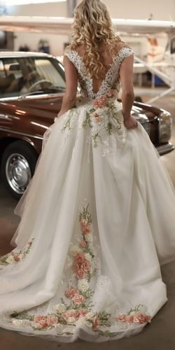 white wedding dress with colored flowers
