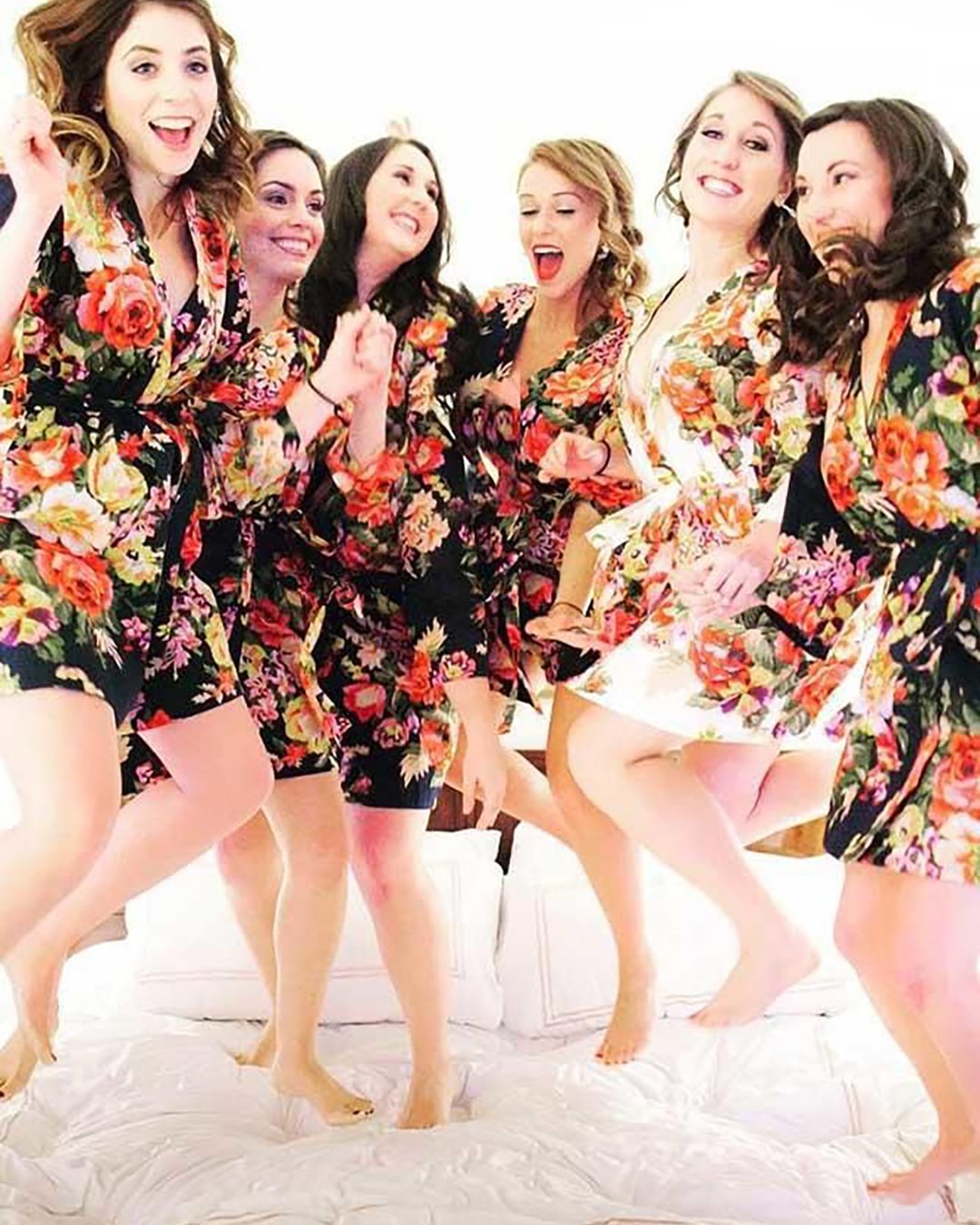 wedding photos with your bridesmaids girls in floral robes clanegessel