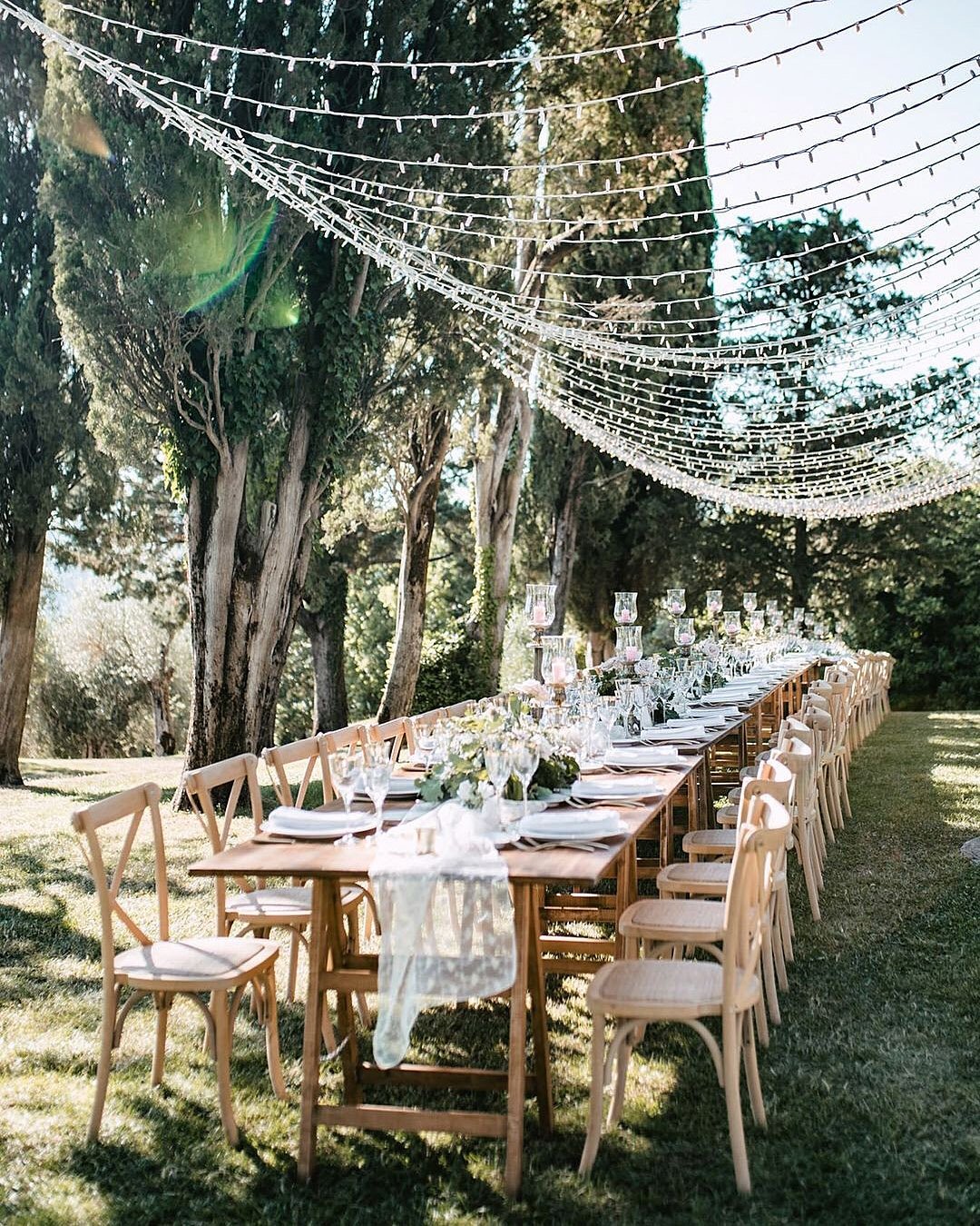 forest wedding theme outdoor reception string lights