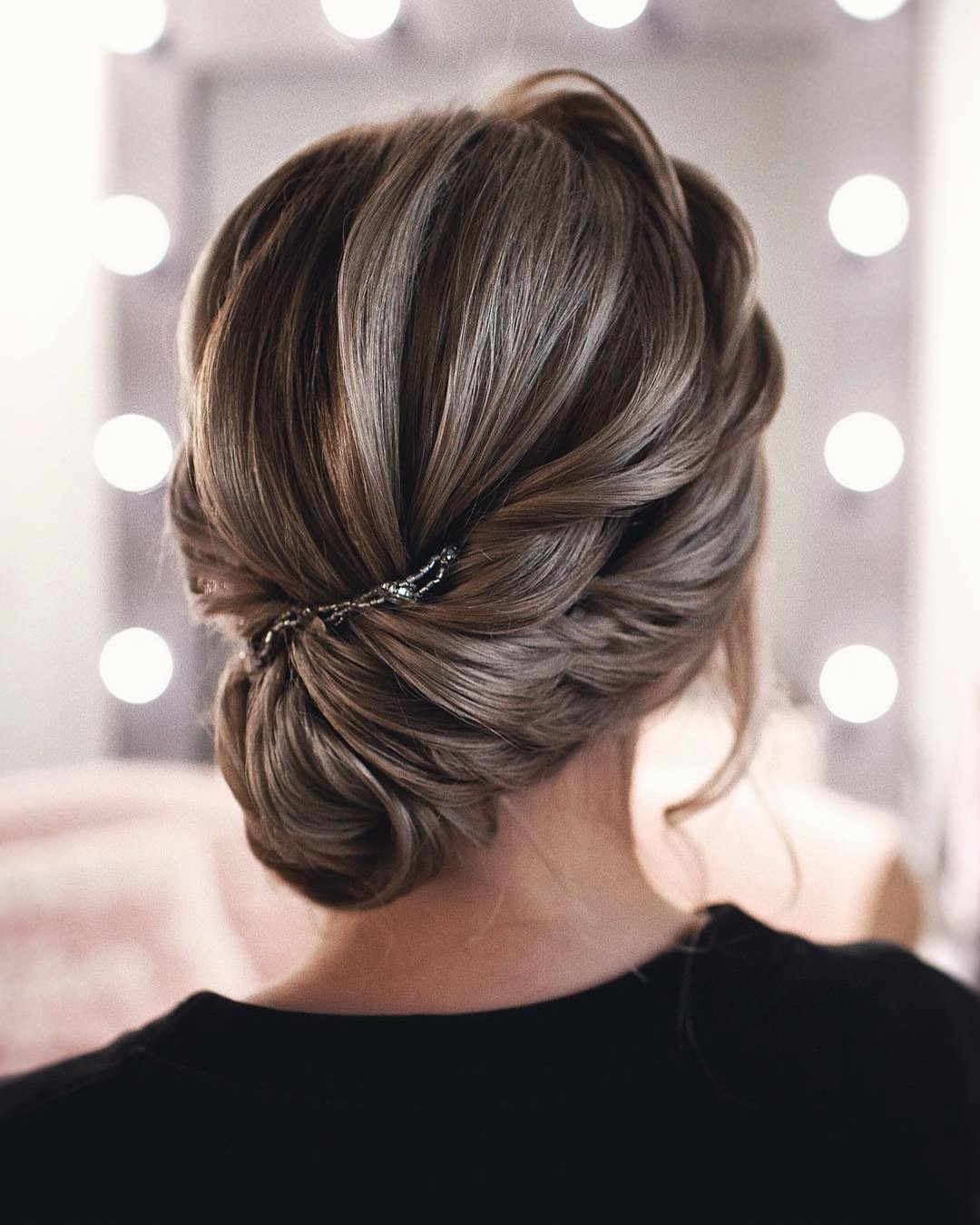 wedding hairstyles assymetrical twisted updo