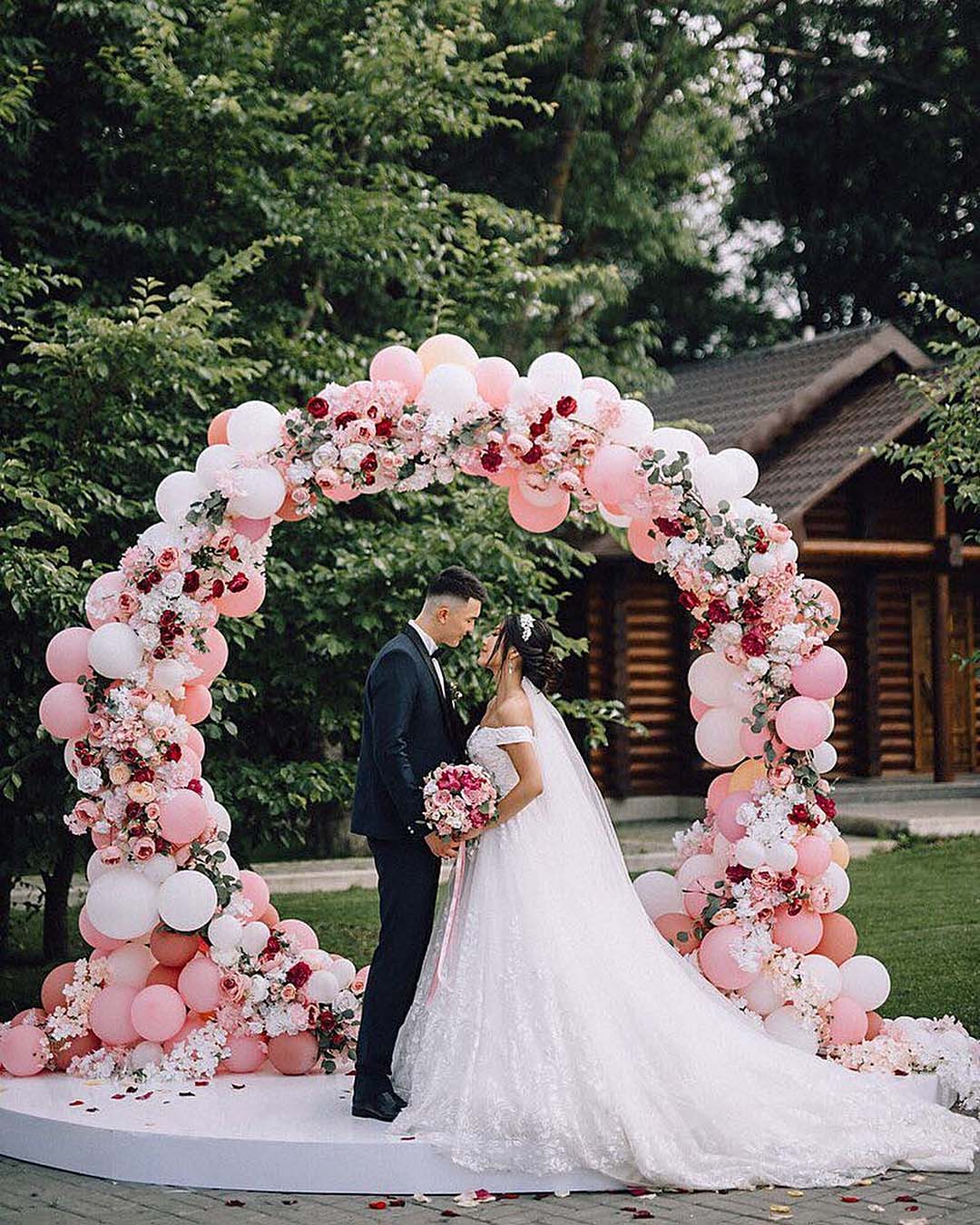 wedding trends wedding arch balloons with flowers