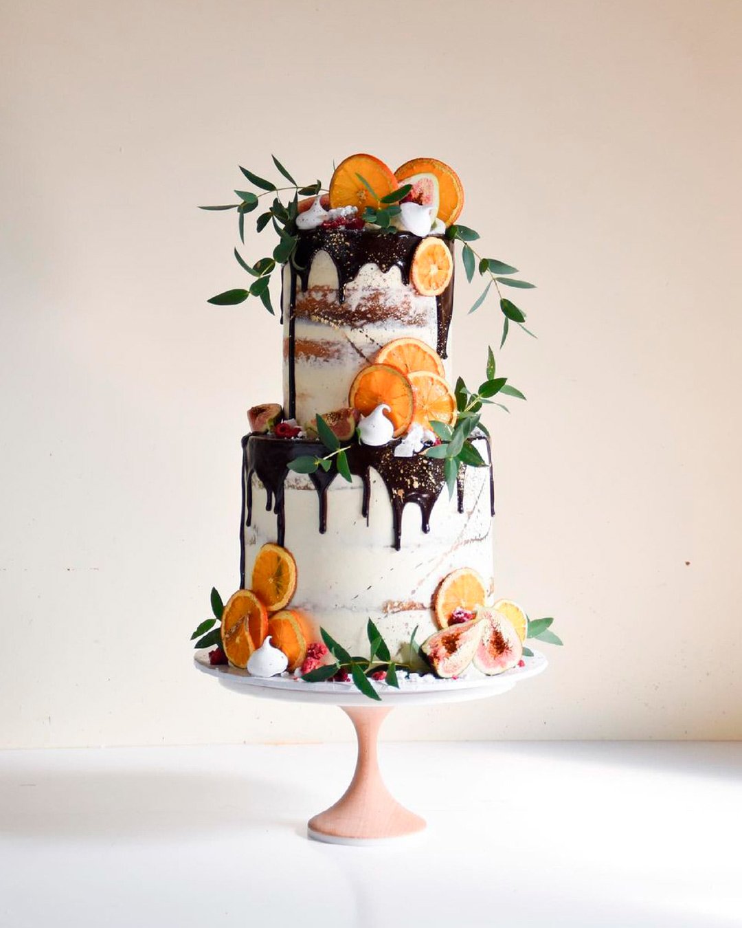 drip wedding cakes citrus greenery