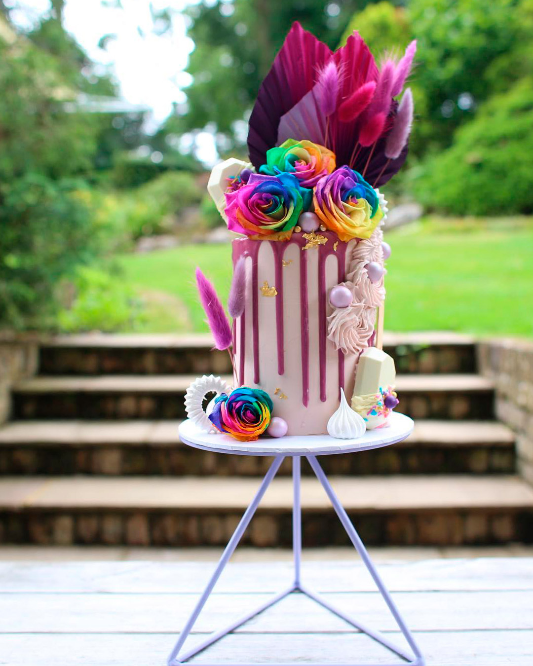 drip wedding cakes white flowers rainbow