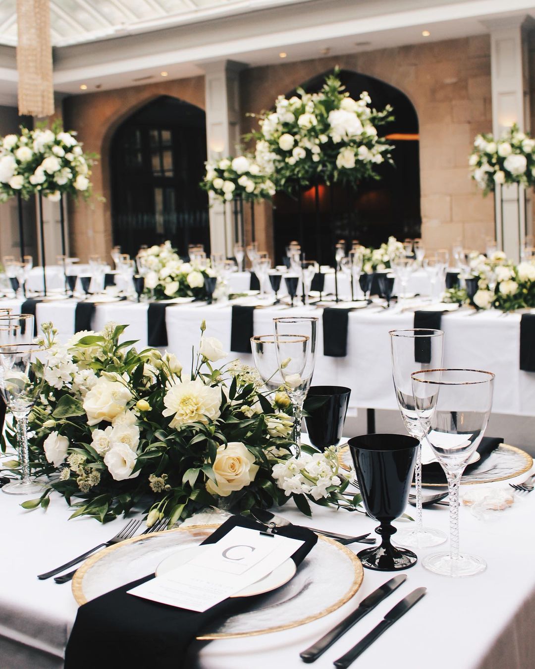 black and white wedding colors floristics and greenery