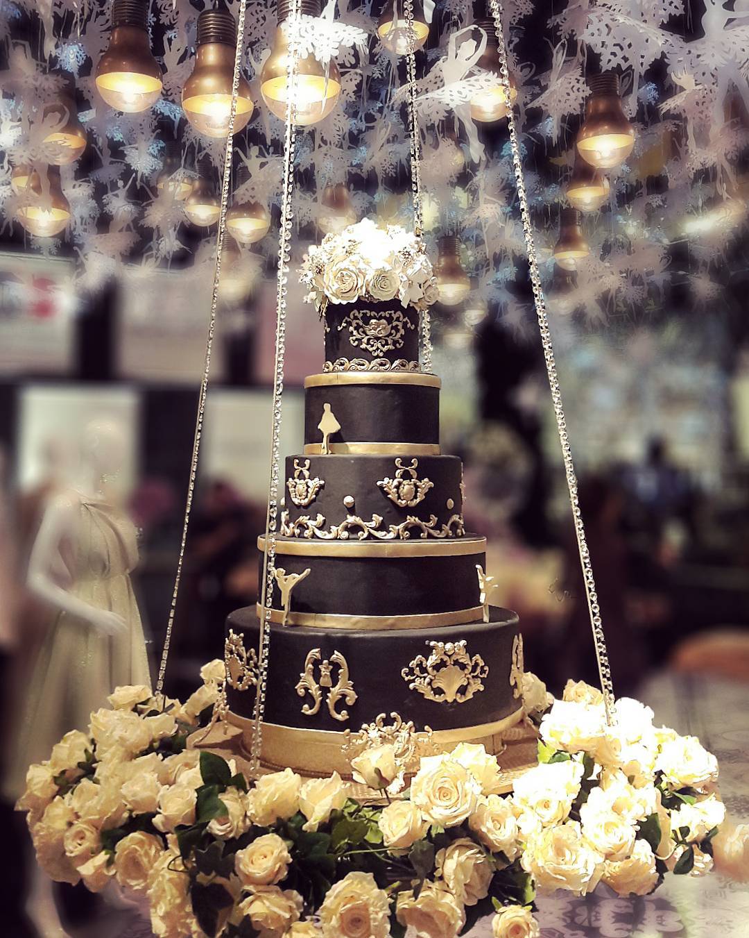 black wedding cake big cake with white flowers lenovellecake