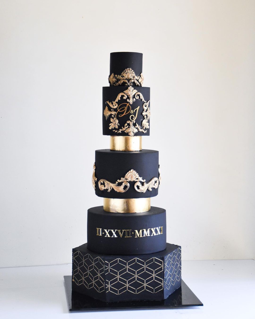 black wedding cake cake with gold and date laombrecreations