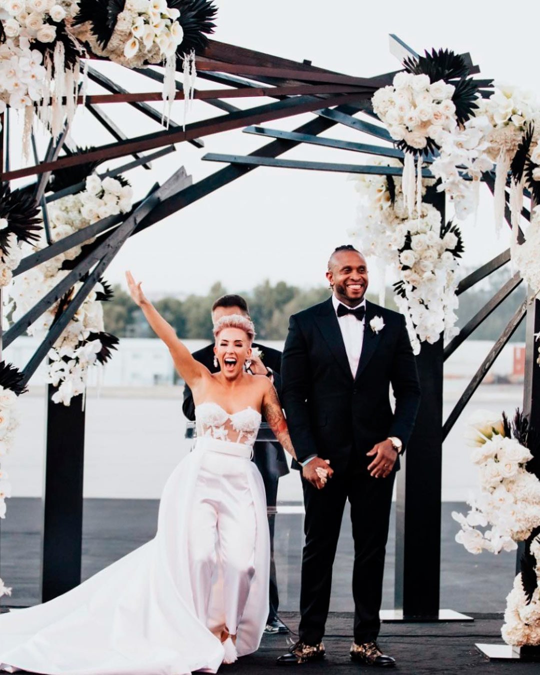 black white wedding colors bride groom aisle arch