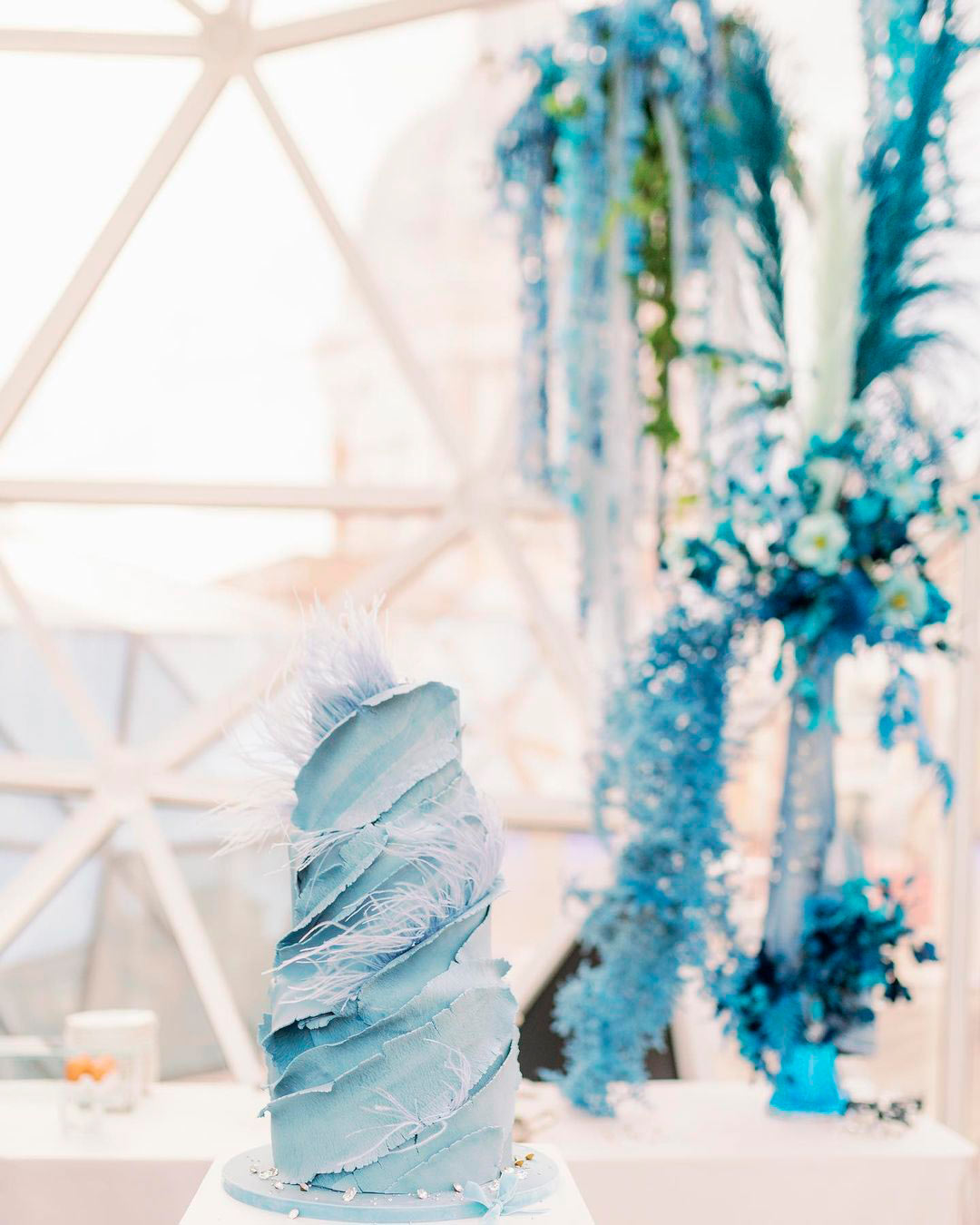 blue and white wedding colors cake feathers