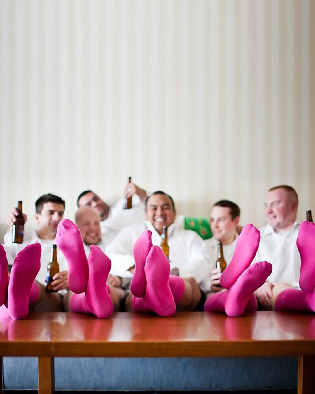 must have wedding photos groom and groomsmen before ceremony funny photos during drink time tara parekh photography