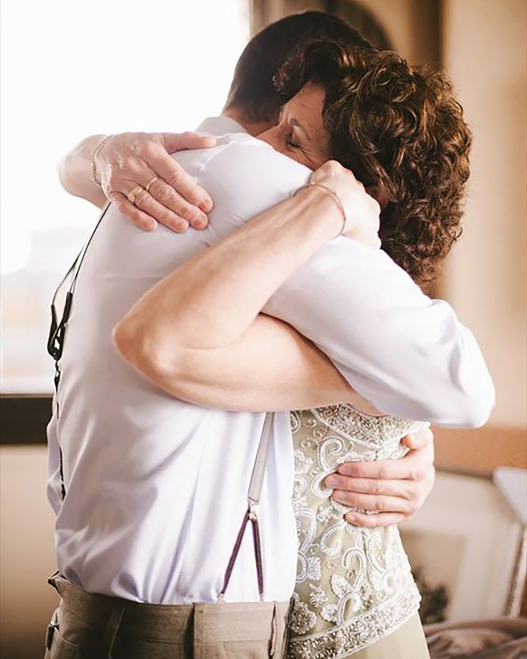 must have wedding photos touching hugs groom with mother michelle gardella photography
