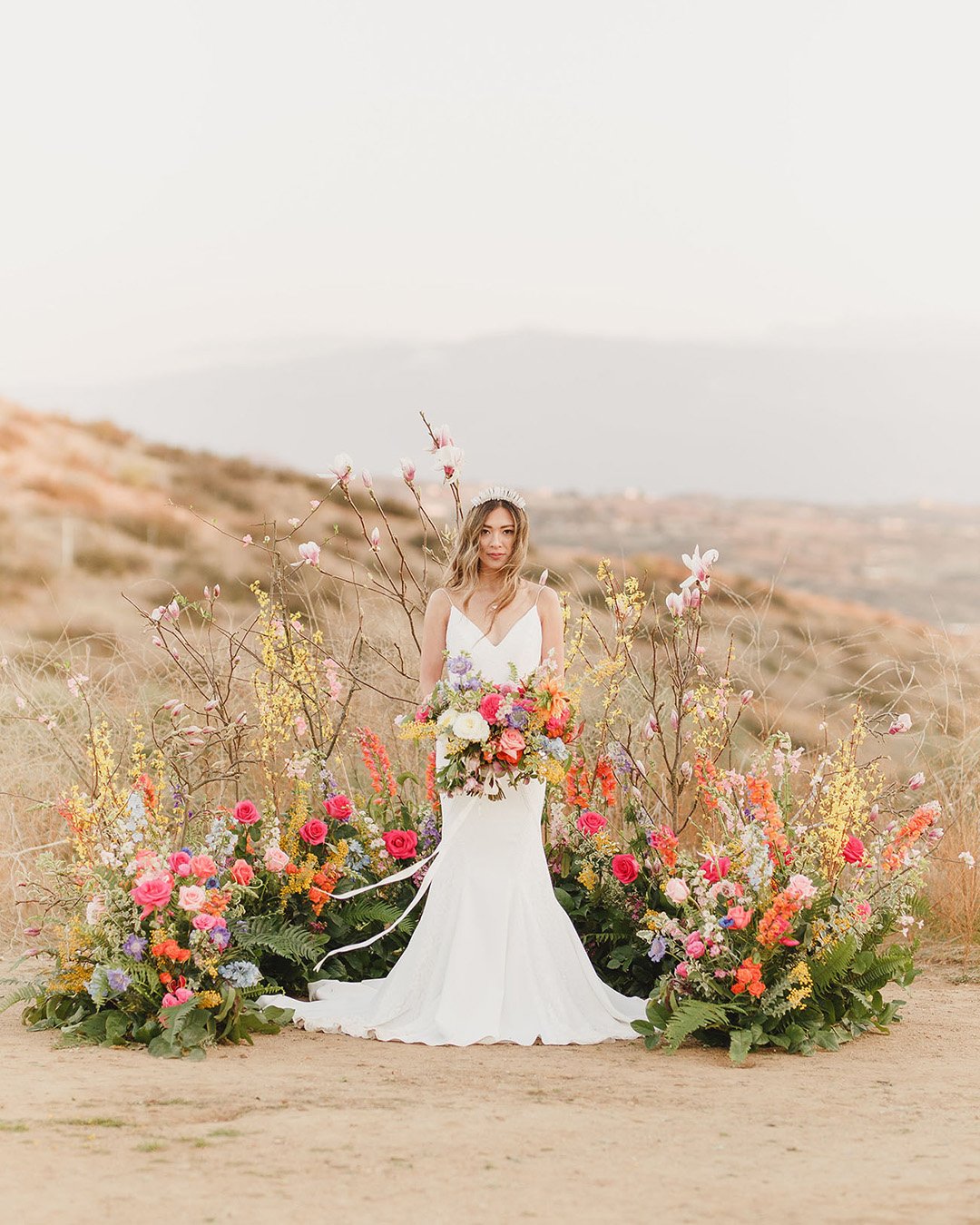 micro wedding venues altar in desert with flowers kristen booth