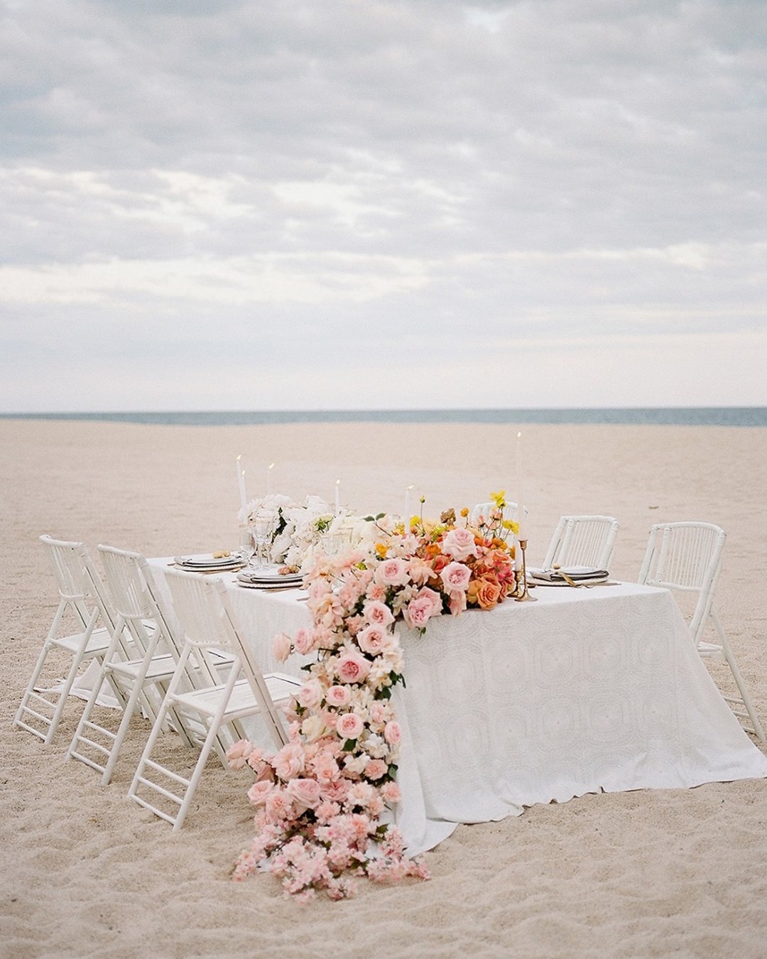 micro wedding venues beach bridal table with flowers jessicariekephoto