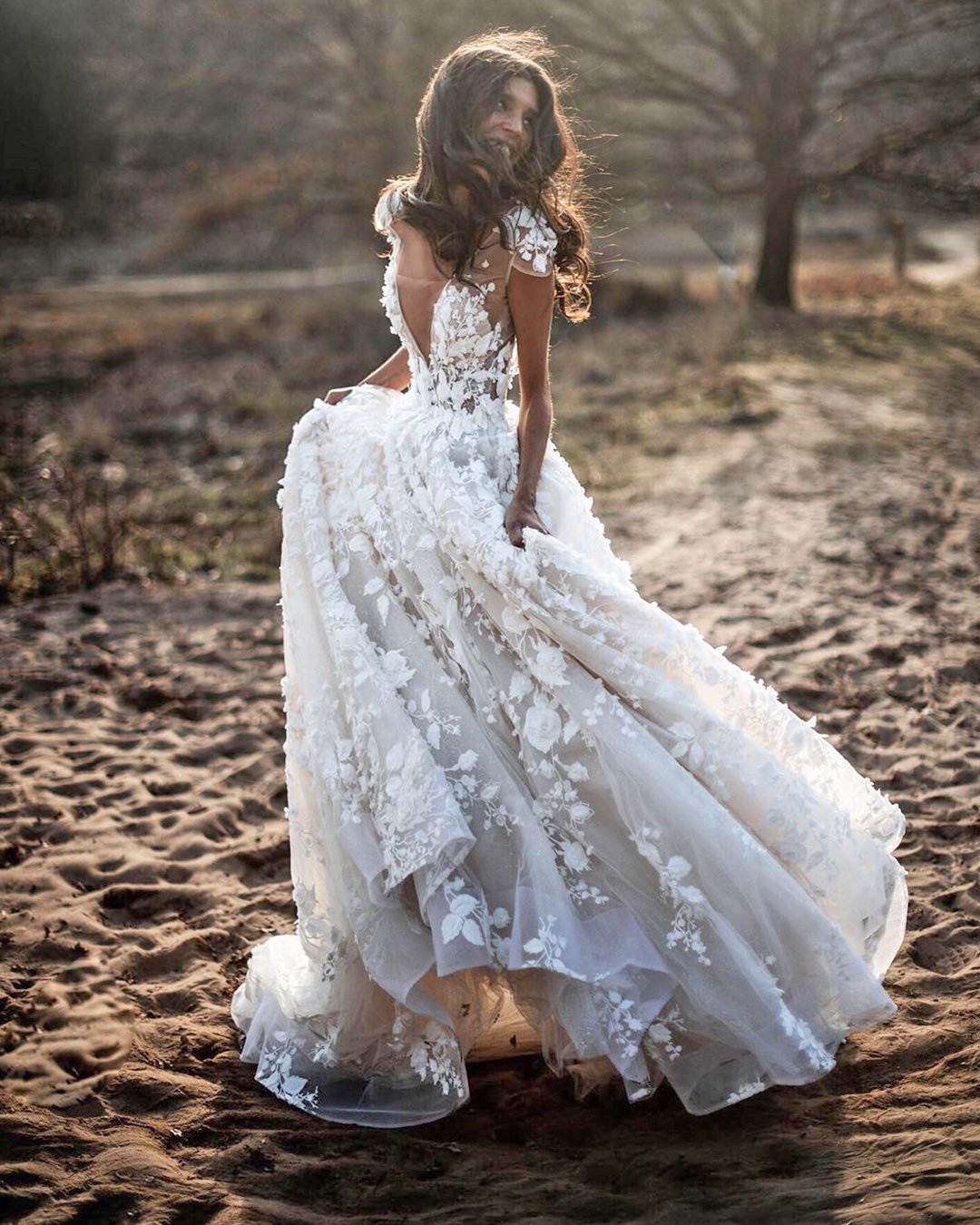 wedding dress designers a line with cape sleeves floral appliques bohemian berta