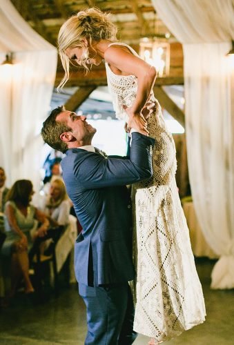 first-dance-wedding-shots-bride-in-grooms-arms-myonelove