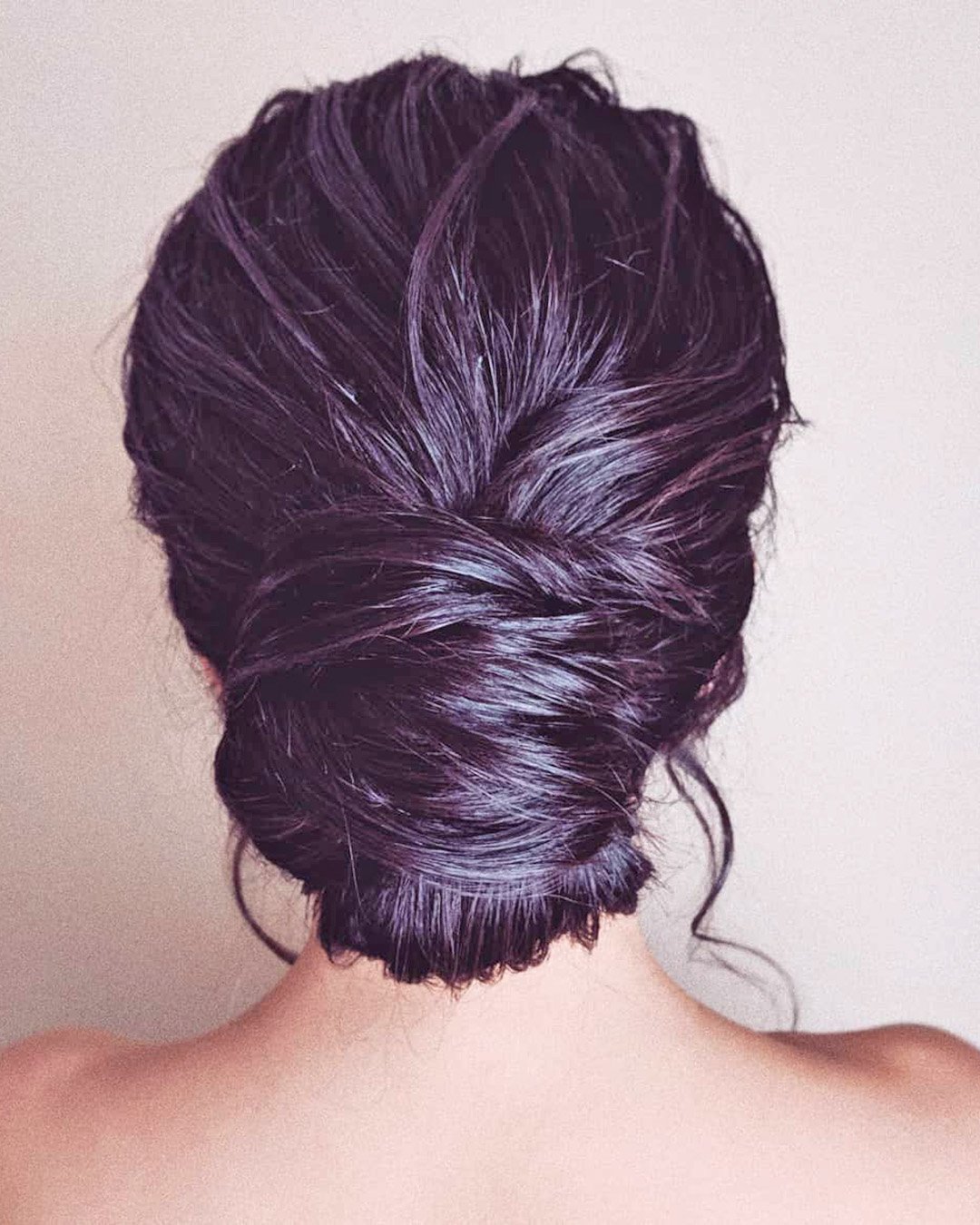 mother of the bride hairstyles messy low bun chignon bridal_hairstylist
