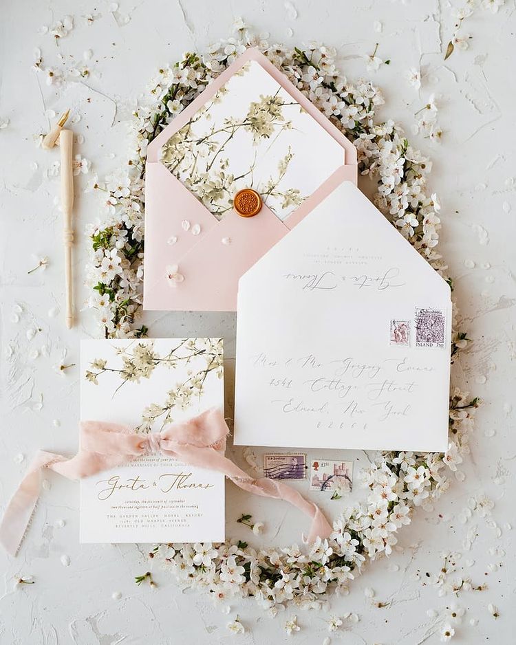 wedding invitation wording blush floral design ribbon