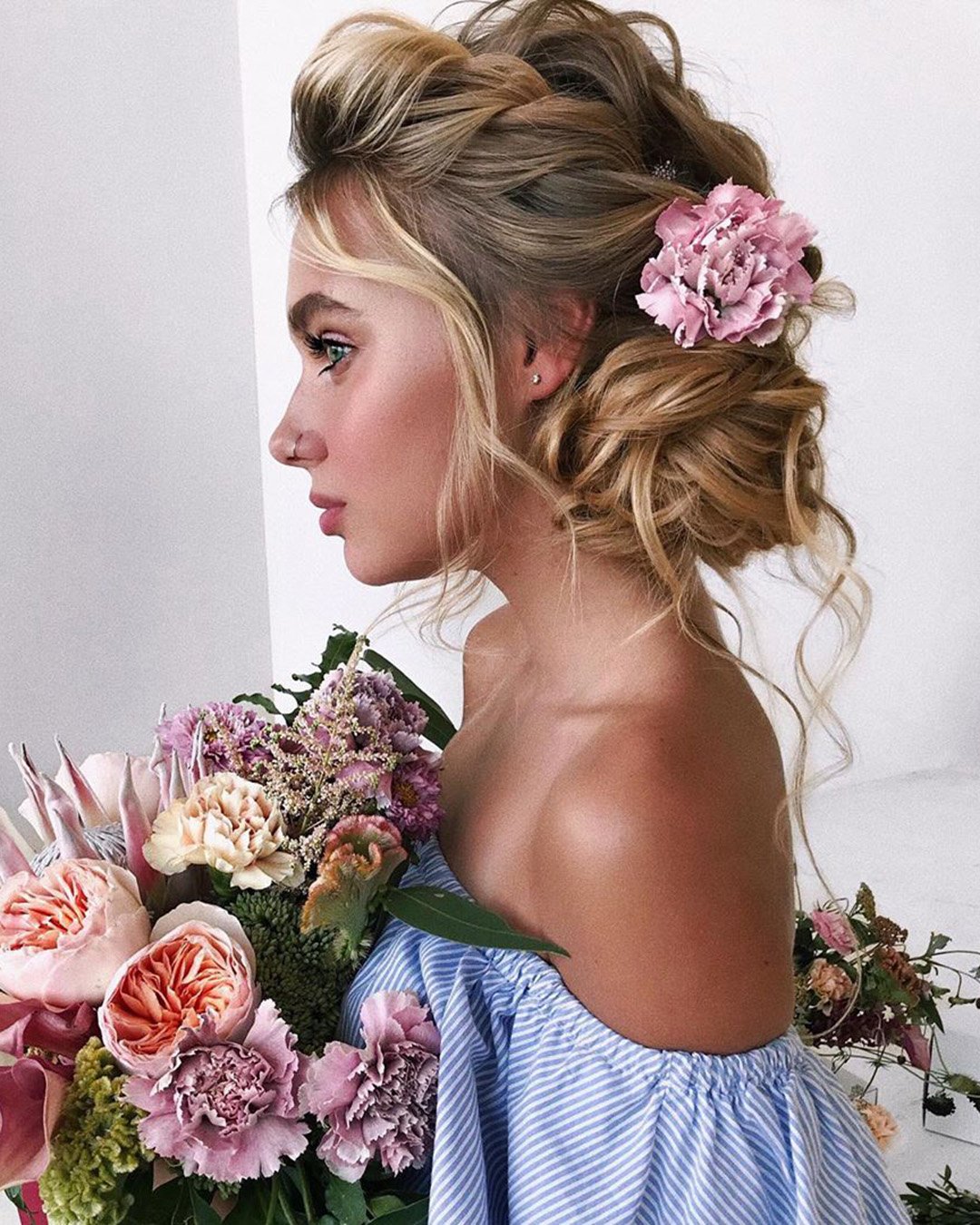 wedding updos curly updo with loose curls and pink flower belaya_lyudmila