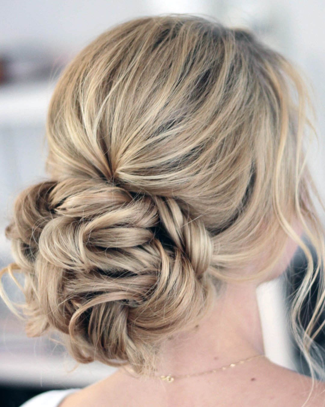bridesmaid hairstyles textured updo swept with loose curls slmakeupandhair