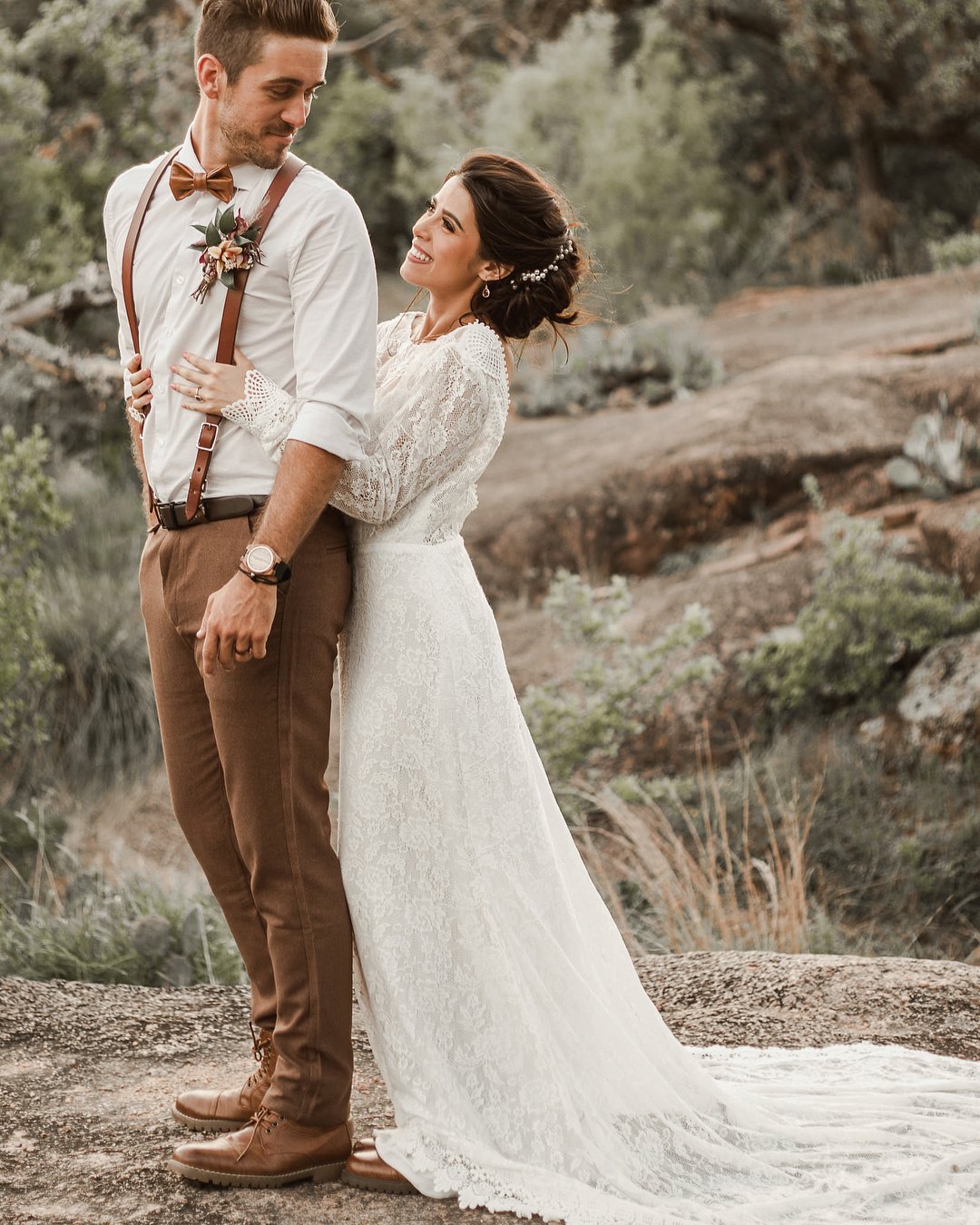 groom attire with bow suspenders boutonnieres flora and lane