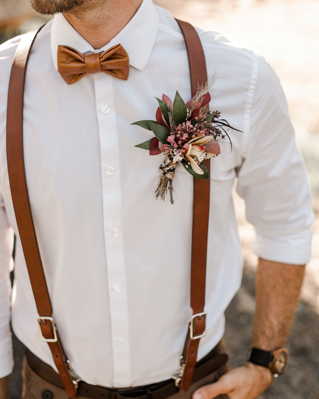 groom attire with bow tie boutonniere rustic boho wild love