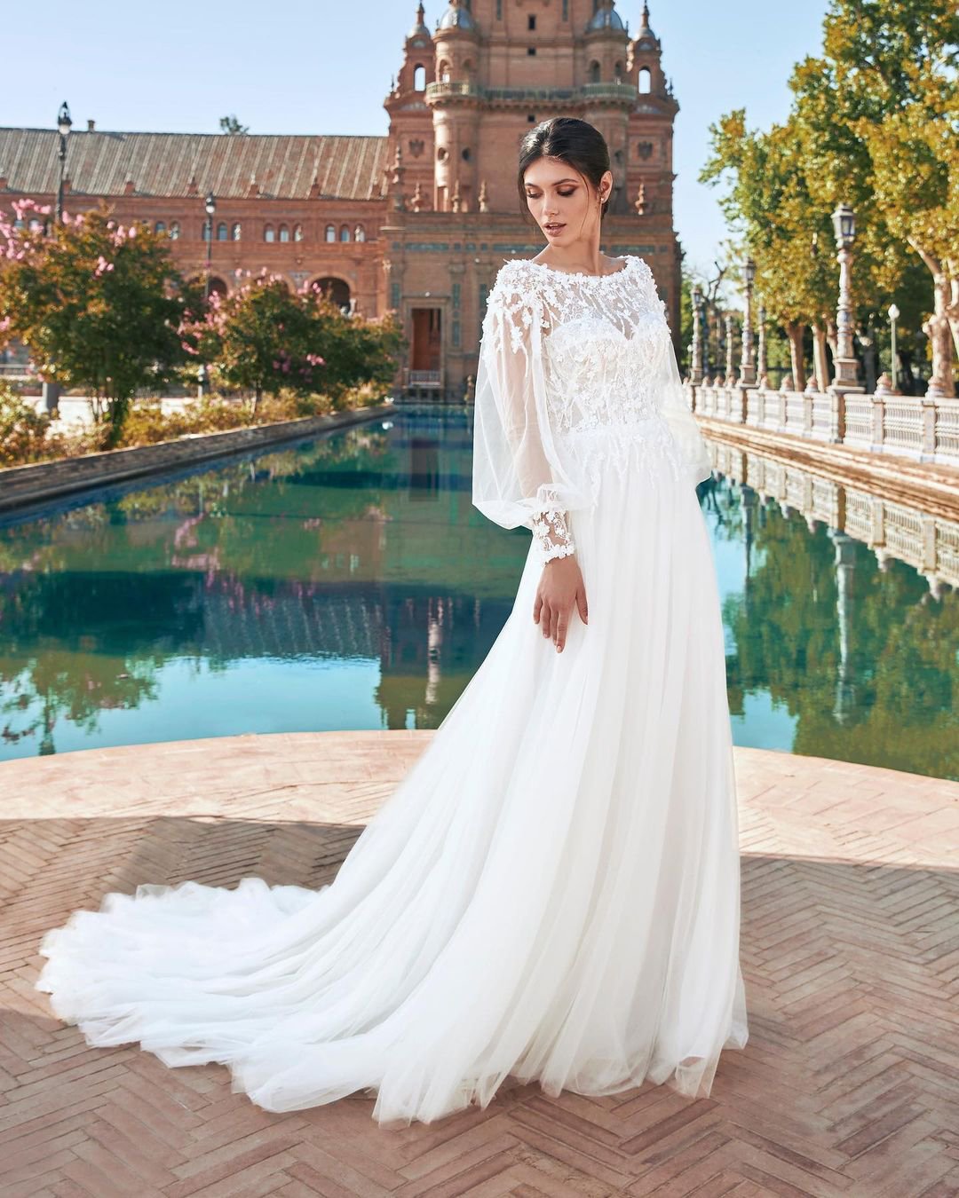 long sleeve wedding dresses with cape lace floral pronovias